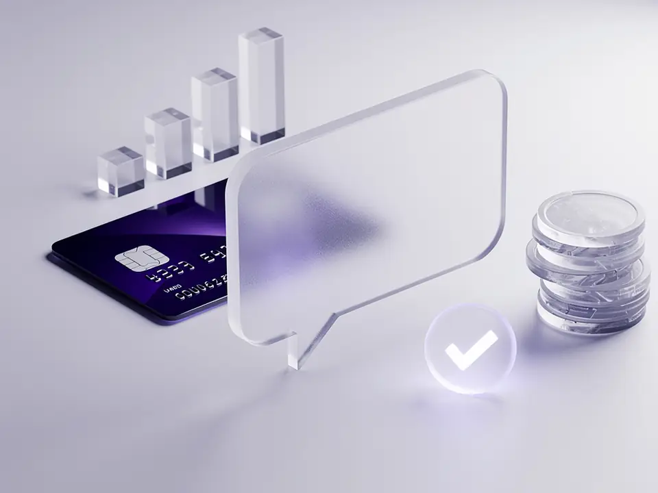 A glass chat bubble, a purple payment card, coins and a check mark